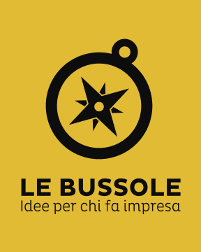 A compass icon on a yellow background with text "Le Bussole Idee per chi fa impresa".